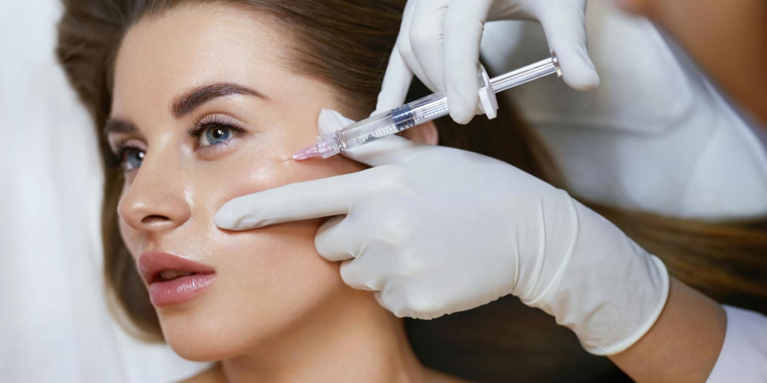 A woman having cosmetic injectables done to improve her appearance